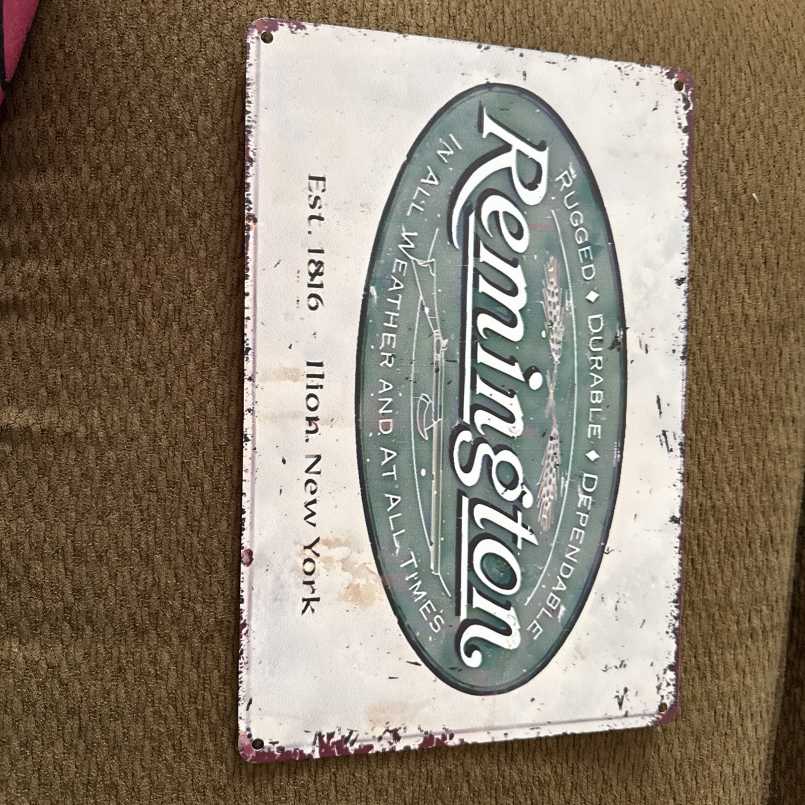 Remington - Rugged And Dependable In All Weather Reproduction Metal Tin 8”x12” Remington - Rugged And Dependable In All Weather Reproduction Metal Tin 8”x12”