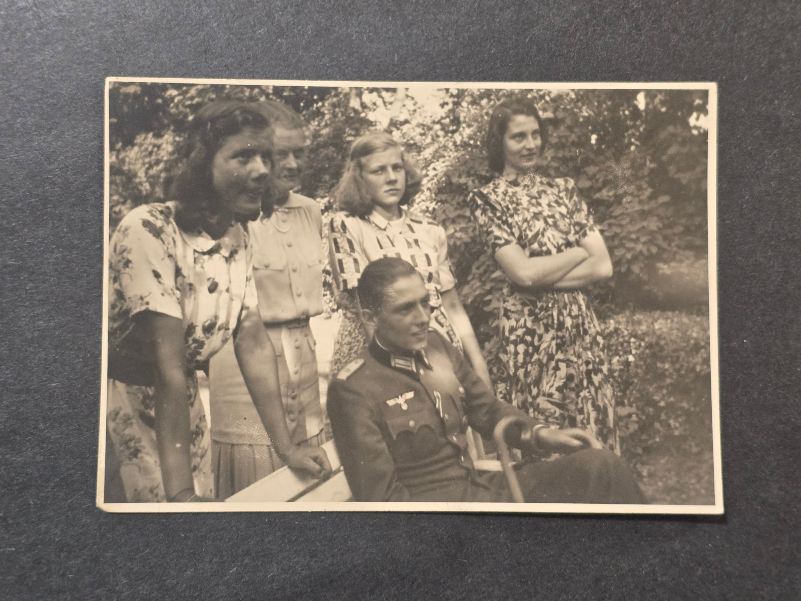 YOUNG DECORATED WEHRMACHT SOLDIER w SISTERS PHOTO RPPC WW2 German Postcard