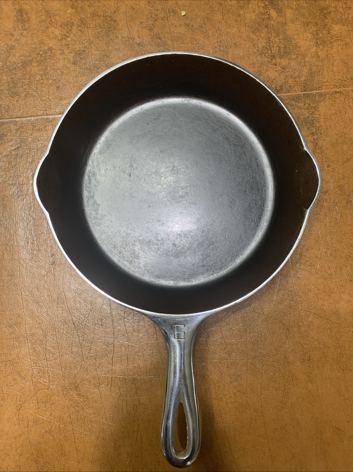 Griswold No. 6 699 K Erie PA Cast Iron skillet. Griswold No. 6 699 K Erie PA Cast Iron skillet.