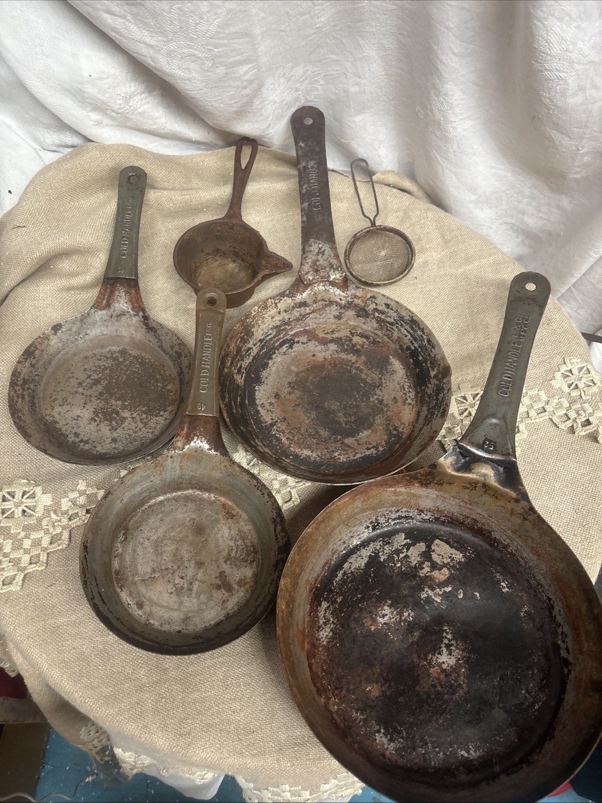 3 Historic Lalance & Grosjean cowboy skillets 1 Unbranded 1 Cast Iron Ladle