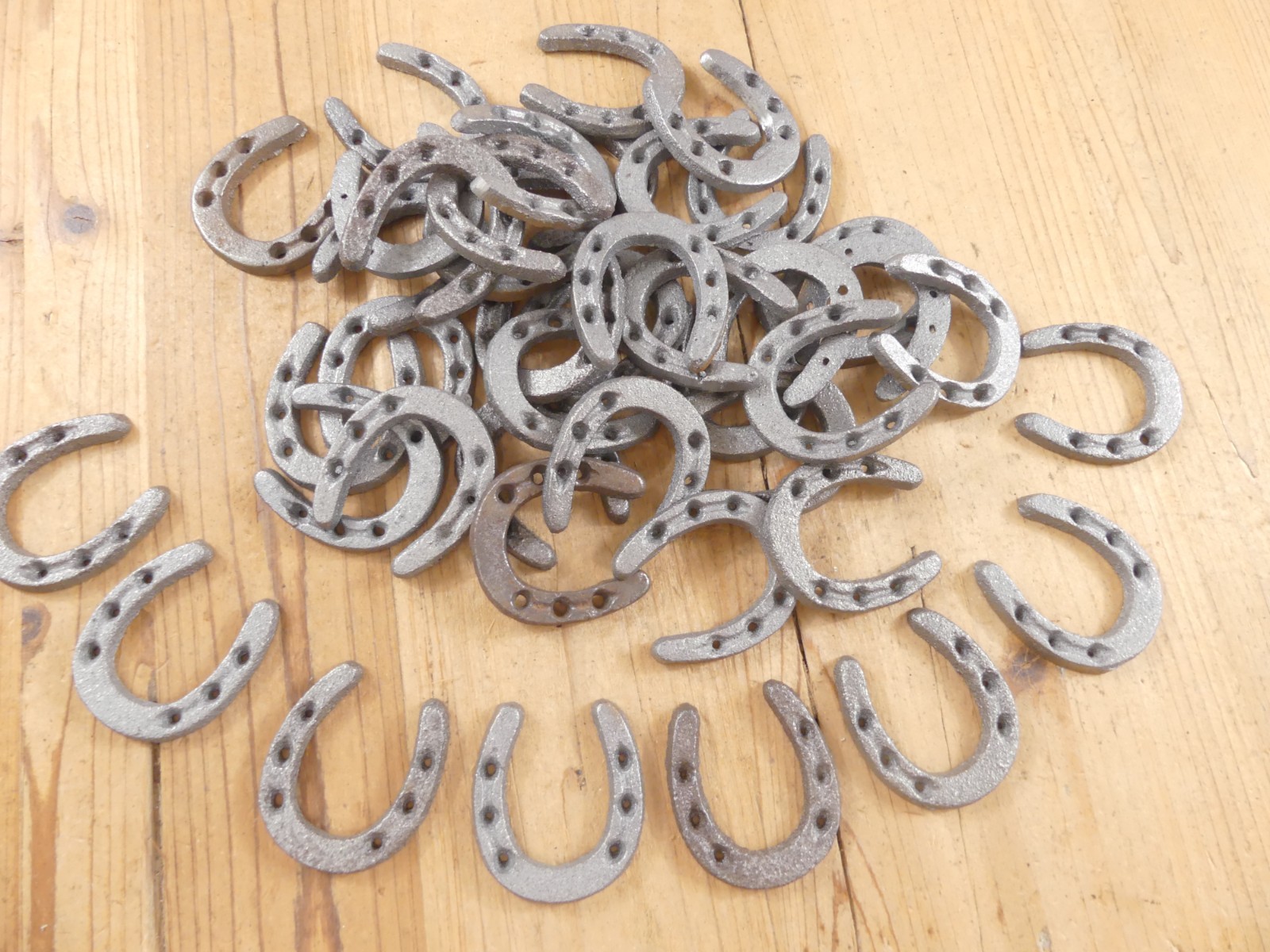 50 SMALL CAST IRON HORSESHOES  **HAVE RUST** CRAFTS BARGIN BIN DECOR HORSE SHOE