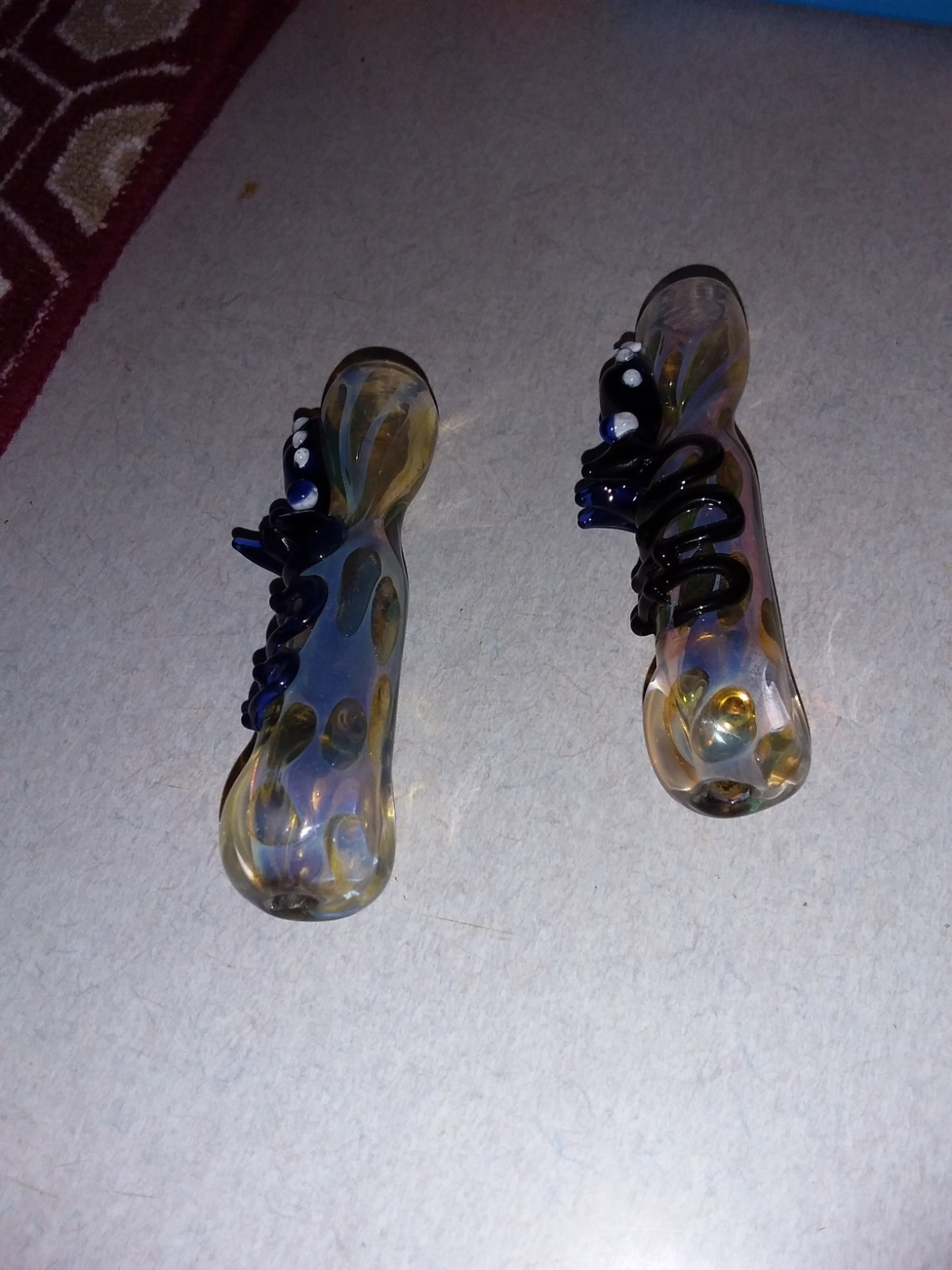 Two Chillums Extra Thick Glass Dragon Art One Blue other  One Pink And Black.