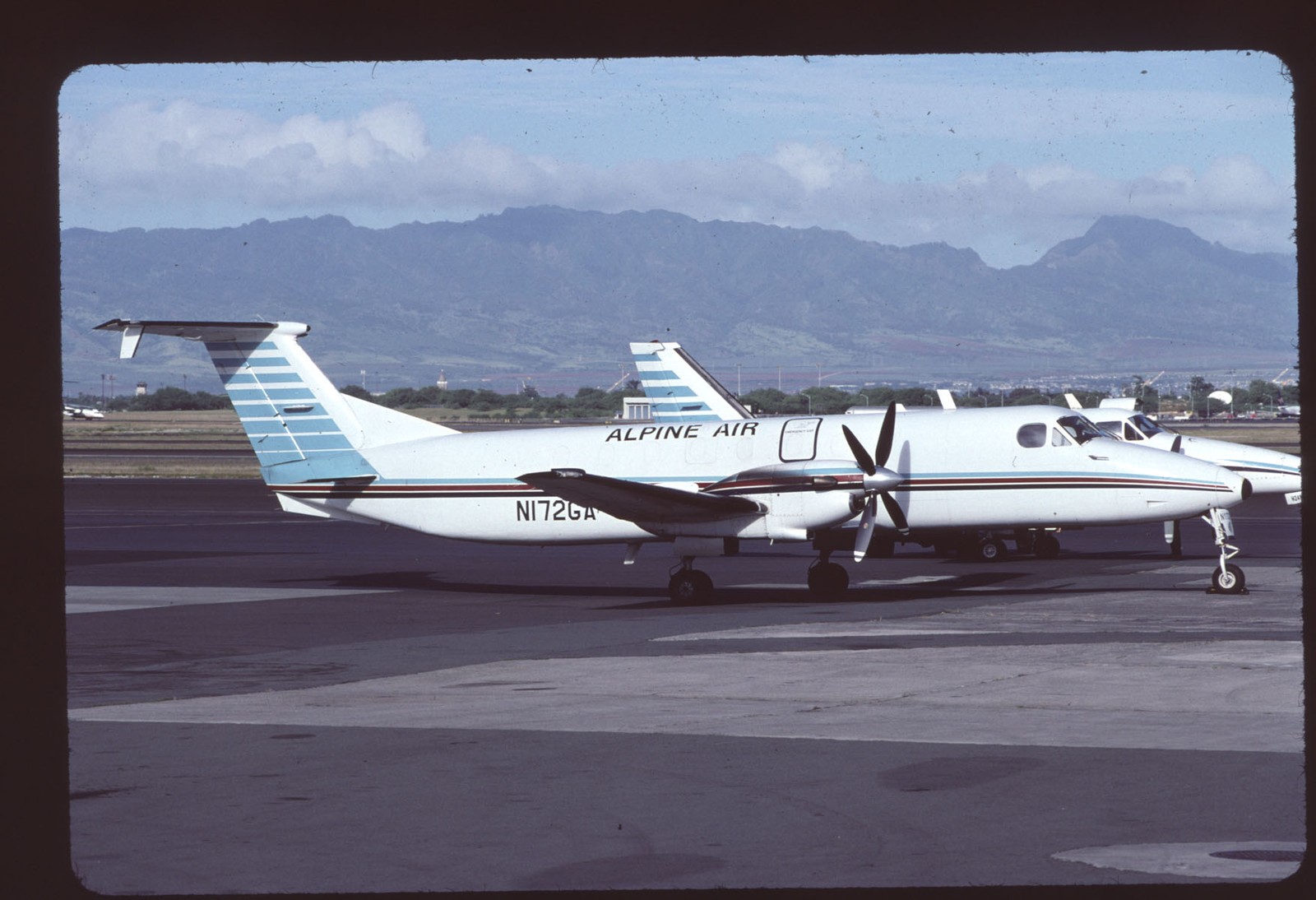 Orig 35mm airline slide Alpine Air Beech 1900C N172GA