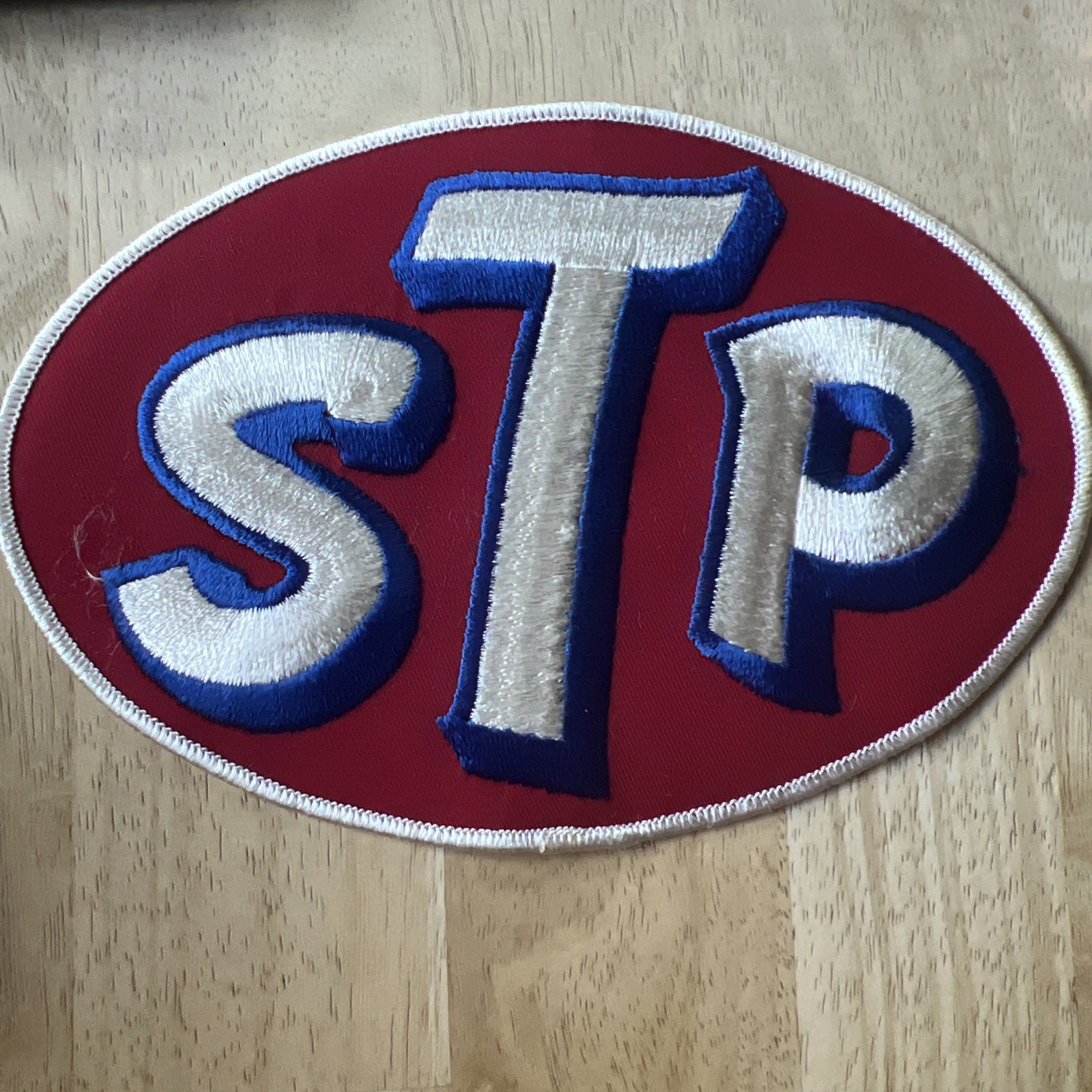 VINTAGE LARGE STP MOTOR OIL COMPANY ADVERTISING UNIFORM JACKET PATCH