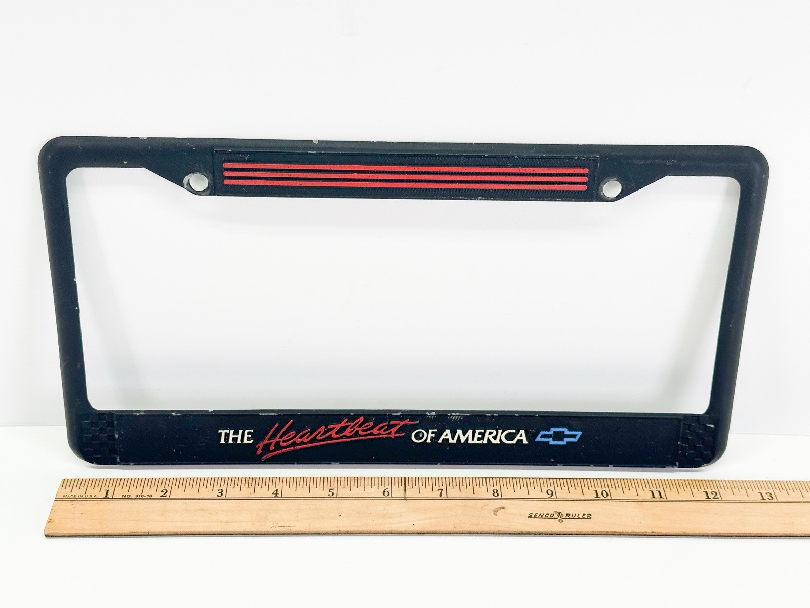 Vintage 1980\'s Chevrolet THE HEARTBEAT OF AMERICA Metal License Plate Frame VHTF
