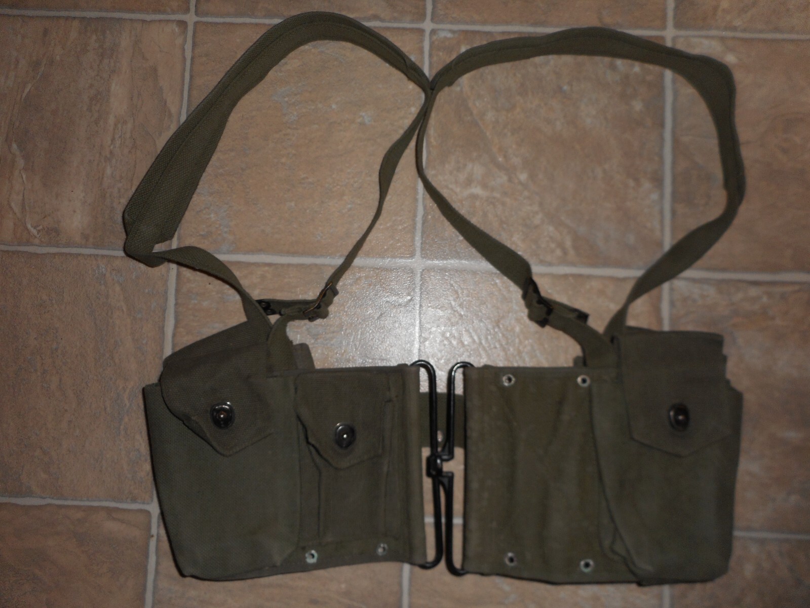 Vintage Belgian army combat belt rig with ammo pouches and suspenders 