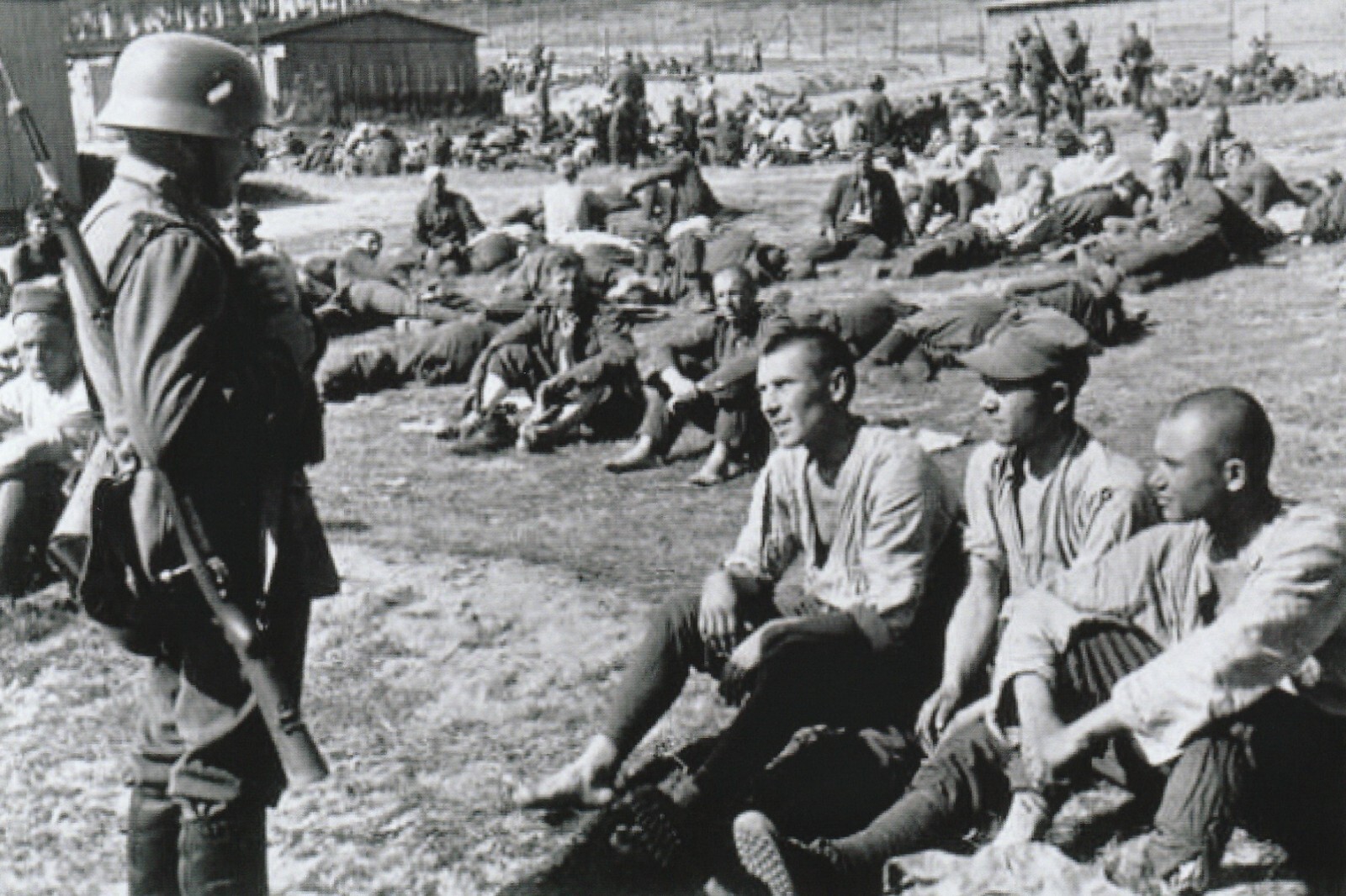WW II - German  Photo -- Soldier Gaurds Polish Prisoners