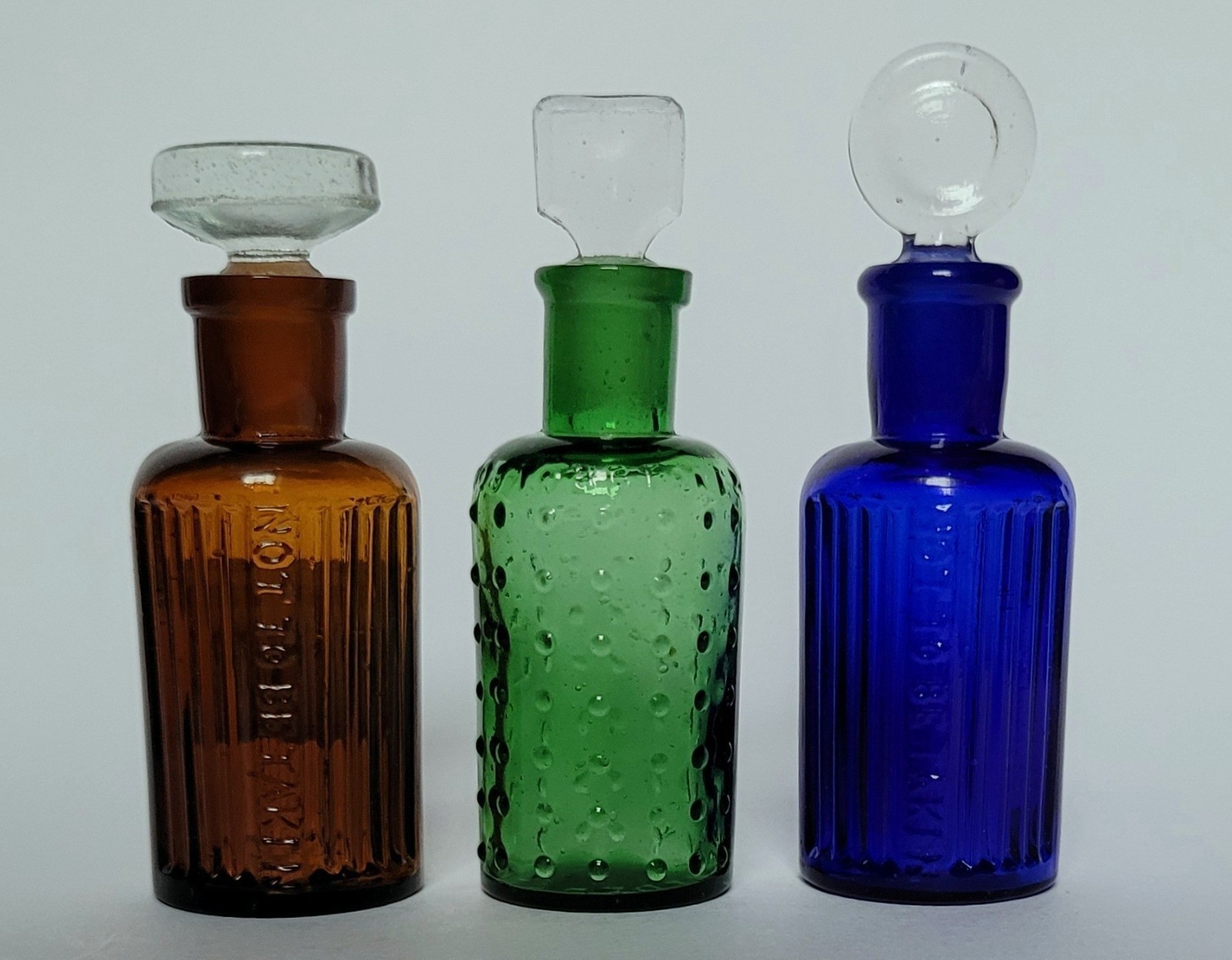 Extremely rare set of antique Bailey poison bottles & stoppers