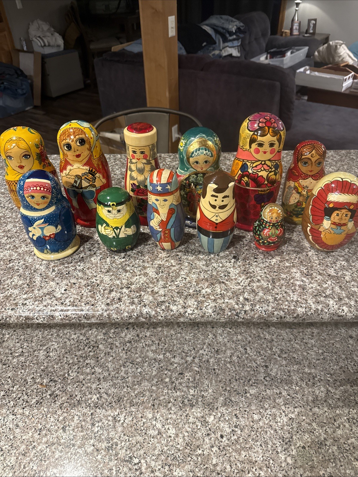 Lot Of 12 Miscellaneous Nesting Dolls.  All Complete