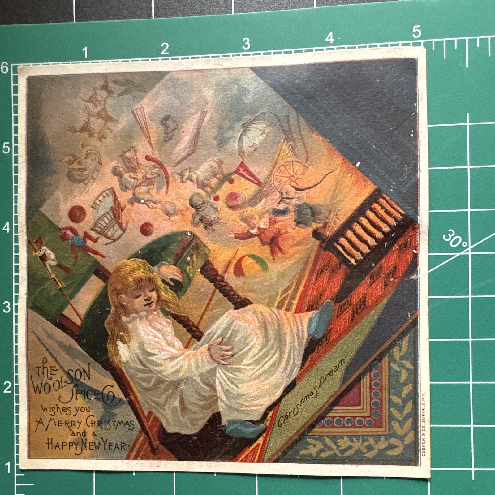1890’s Lion Coffee, Woolson Spice Co.   Christmas/New Year Dream Trade Card