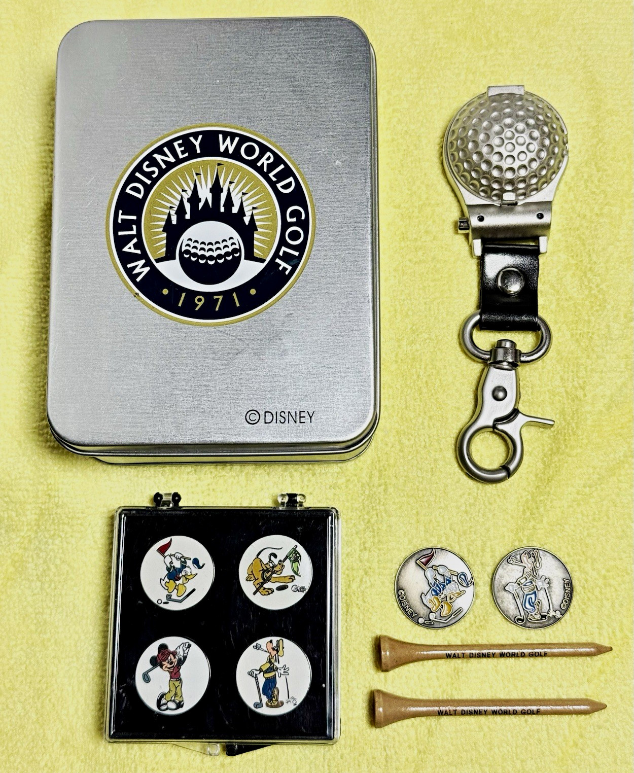Vintage Walt Disney World Golf 1971 Tin Set with Keychain Watch, Markers & Tees Vintage Walt Disney World Golf 1971 Tin Set with Keychain Watch, Markers & Tees