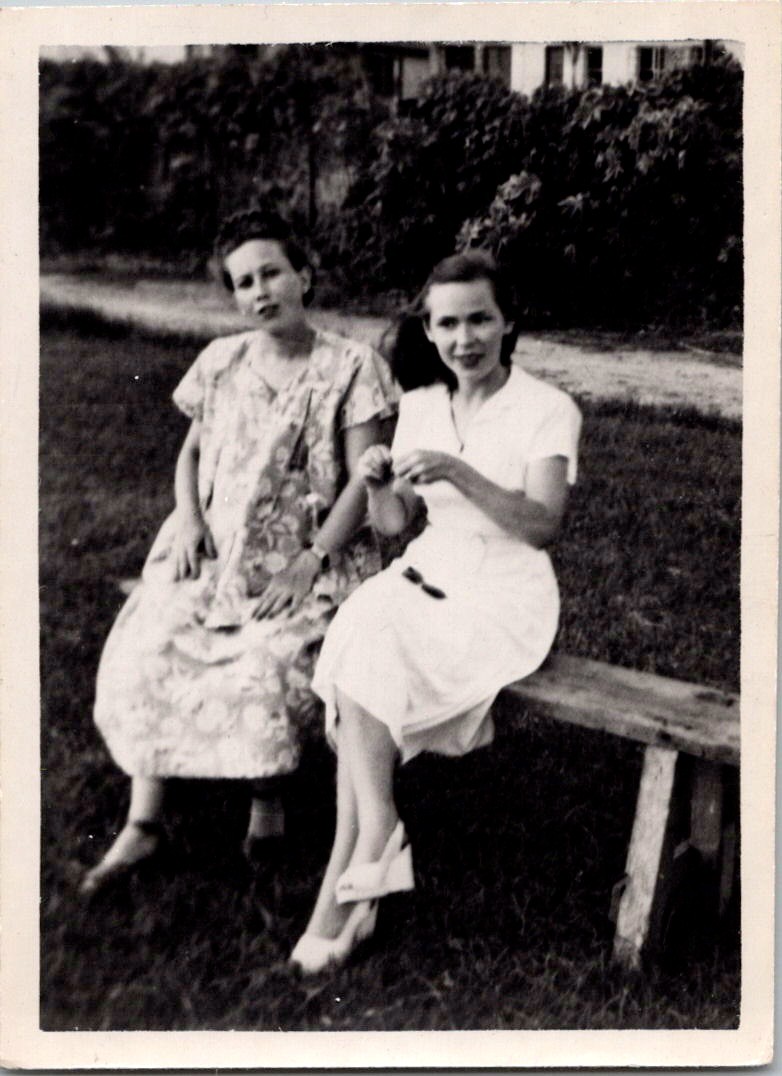 Two Women Seated on Wooden Bench, 1940s B&W Snapshot Photo