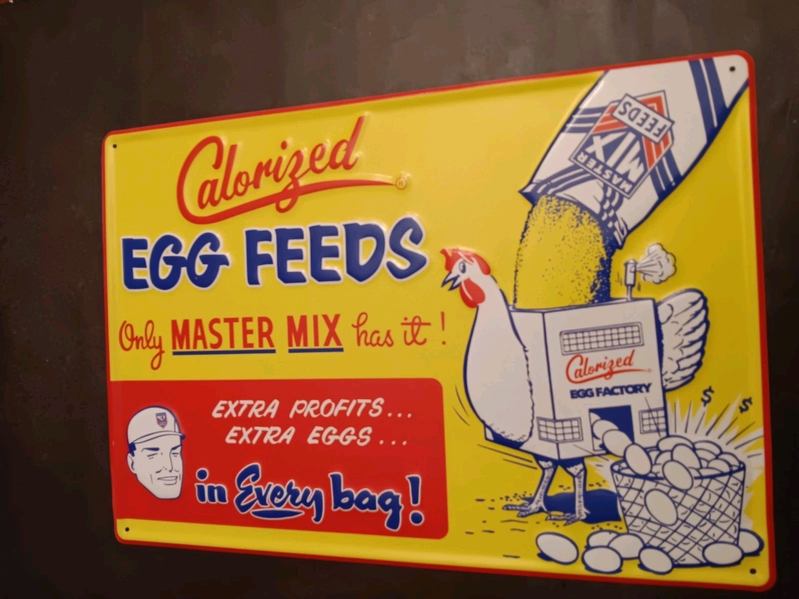Master Mix Egg Feeds 20x14 Inch Embossed Metal Advertising Sign