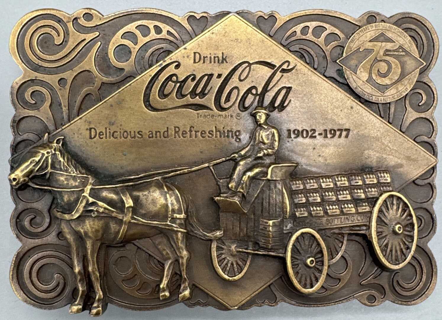VINTAGE 1976 COCA COLA 75th ANNIVERSARY BRASS BELT BUCKLE - BOTTLE OPENER NOS