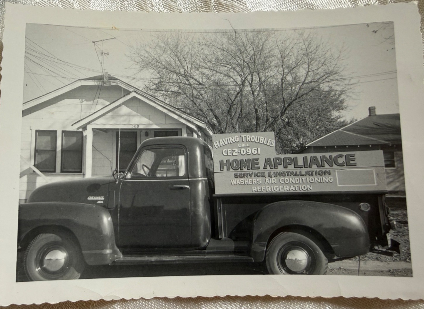 Vintage b/w photo of Home Appliance Service and Advertising Truck 1949