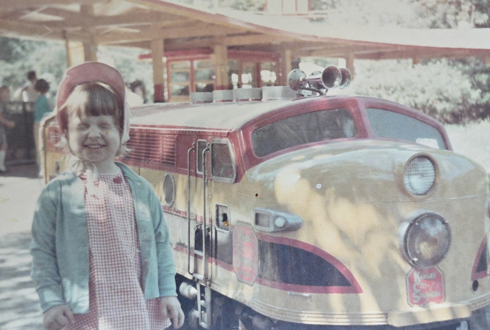 Vintage Photo Snapshot of Young Girl Smiling by Small Kansas City Southern Train Vintage Photo Snapshot of Young Girl Smiling by Small Kansas City Southern Train