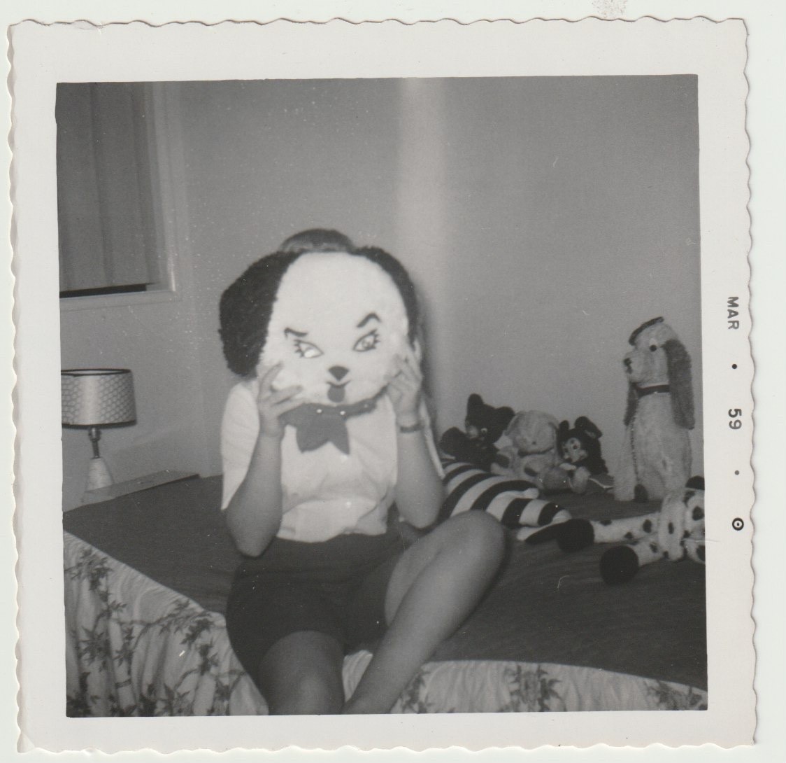 VINTAGE PHOTO/SNAPSHOT - PLAYFUL YOUNG GIRL WITH HER STUFFED ANIMALS, DOG MASK