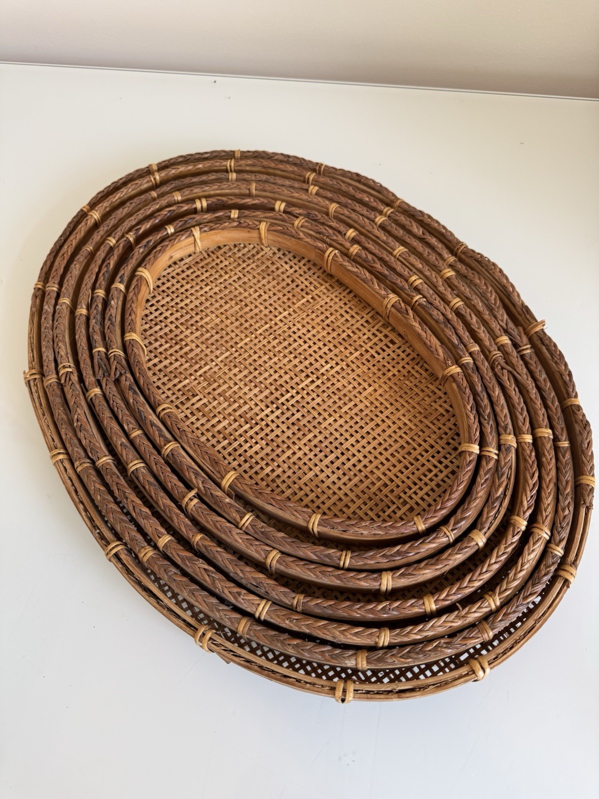 vintage woven rattan and bamboo oval nesting trays platters Set Of 7