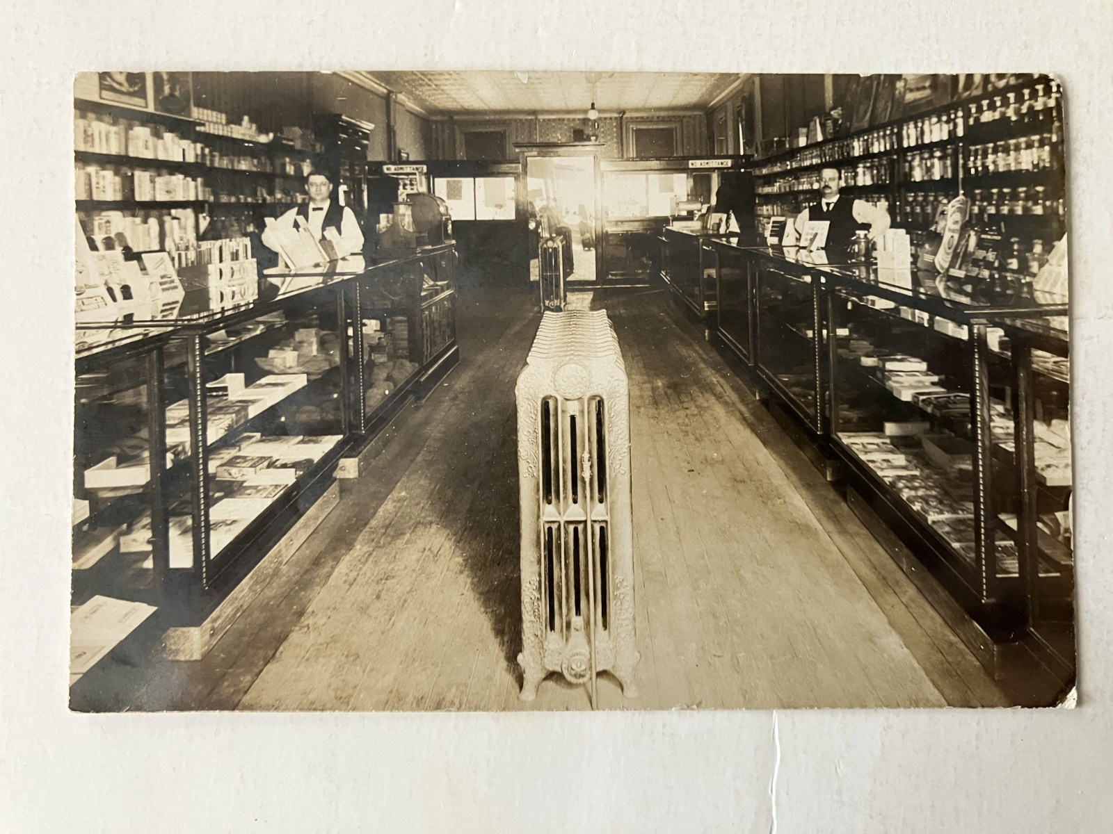 RPPC  STORE INTERIOR PHOTO POSTCARD MAILED IN 1909 FROM JACKSON, MICHIGAN