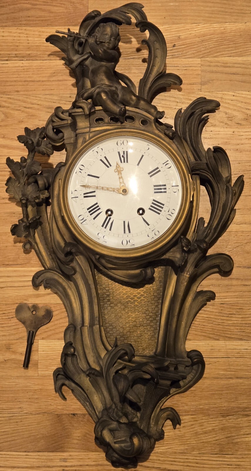 Tiffany & Co Exceptional French Gilt Bronze Cartel Clock. Flute Playing Cherub Tiffany & Co Exceptional French Gilt Bronze Cartel Clock. Flute Playing Cherub
