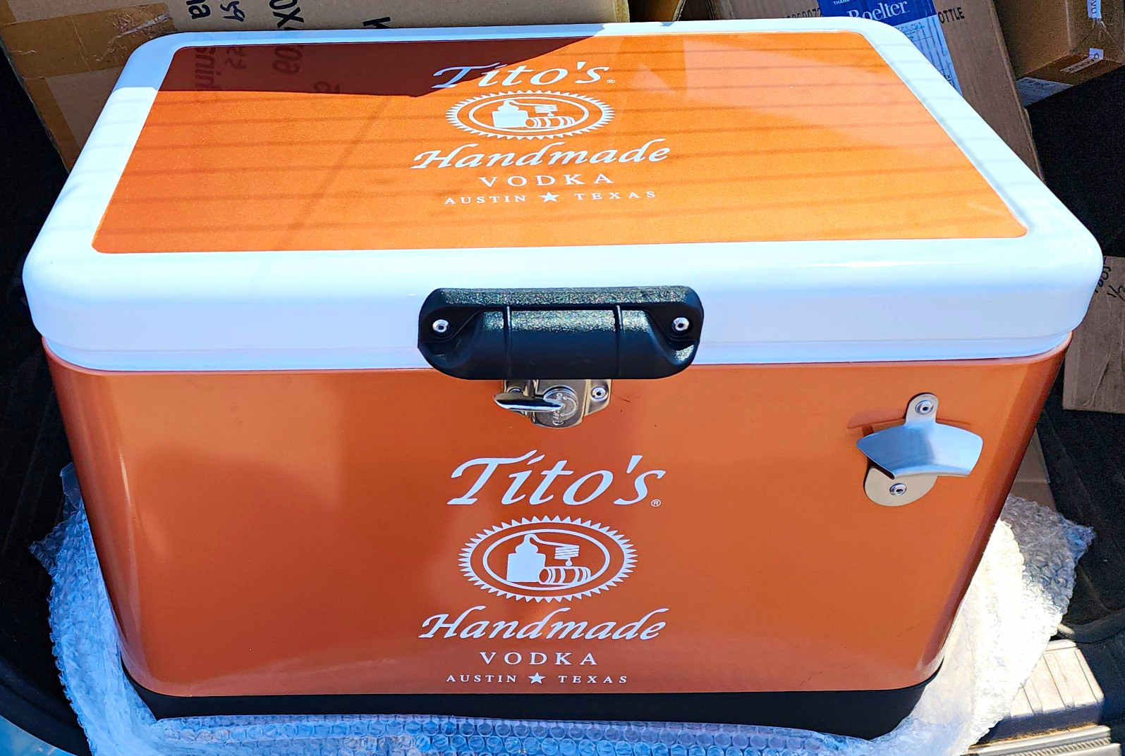 Tito\'s Handmade Vodka Orange Hard Cooler Ice Chest w/ Bottle Opener, White Lid