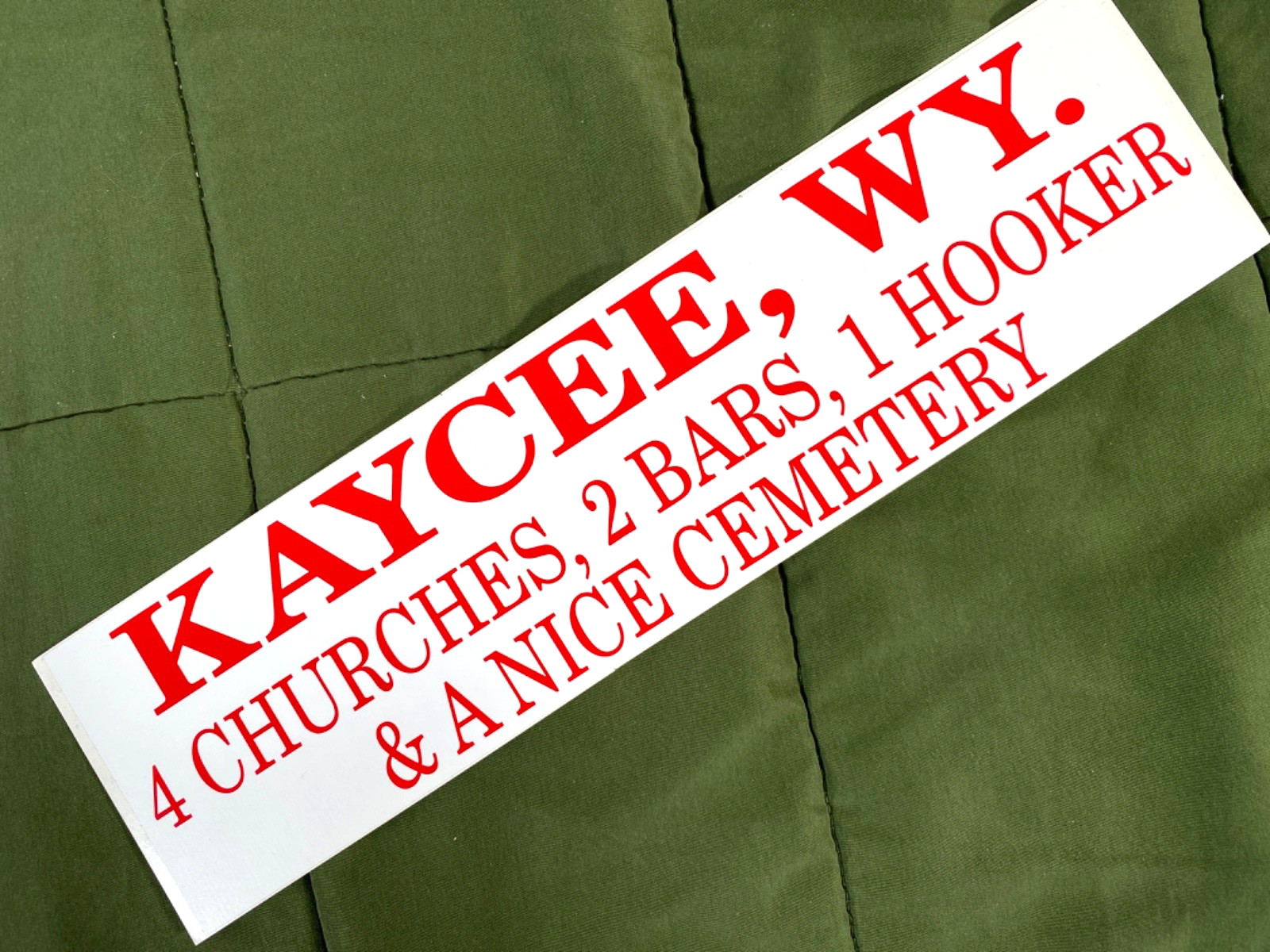 1980s KAYCEE, WYOMING vintage 3x11 bumper sticker 4 CHURCHES, 2 BARS & 1 HOOKER