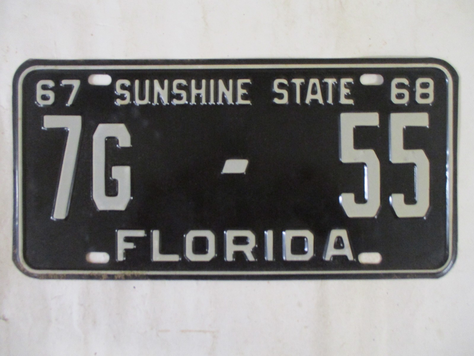 1967 Florida License Plate Tag NOS TRUCK CLEAR YOM ORANGE CO SP