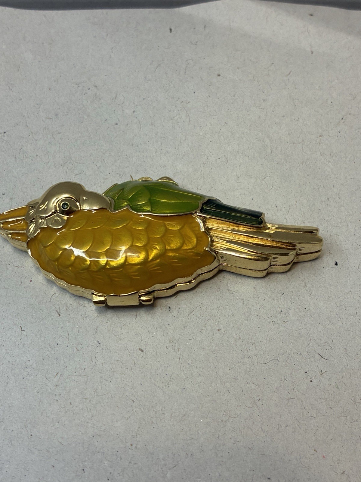“Vintage 1991 Estee Lauder Golden Parrot Solid Perfume Compact Enamel Bird”.