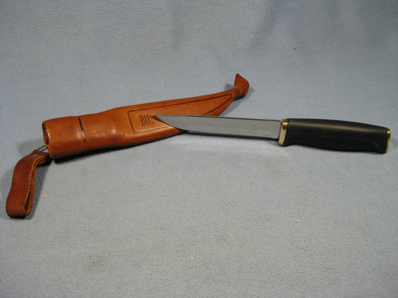 Vintage Normark Fiskars Finland Fixed Blade Hunting Knife w/ Leather Sheath Vintage Normark Fiskars Finland Fixed Blade Hunting Knife w/ Leather Sheath