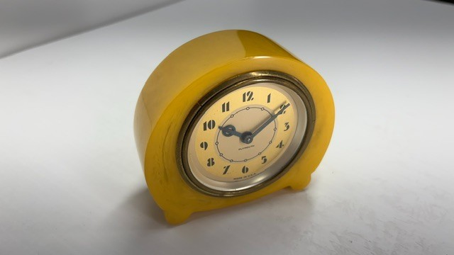Exceptional bakelite catalin Plymouth clock.  Rare color and condition. Chunky.