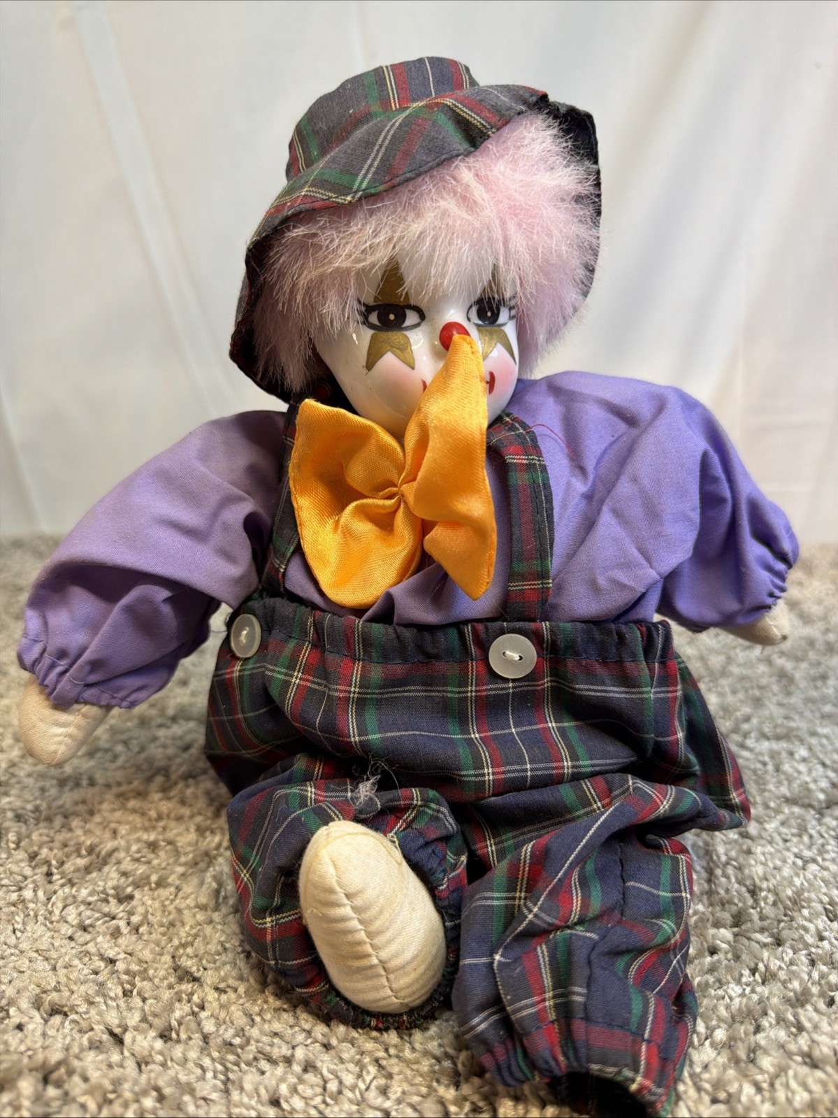 vintage 1990s-era porcelain head clown doll