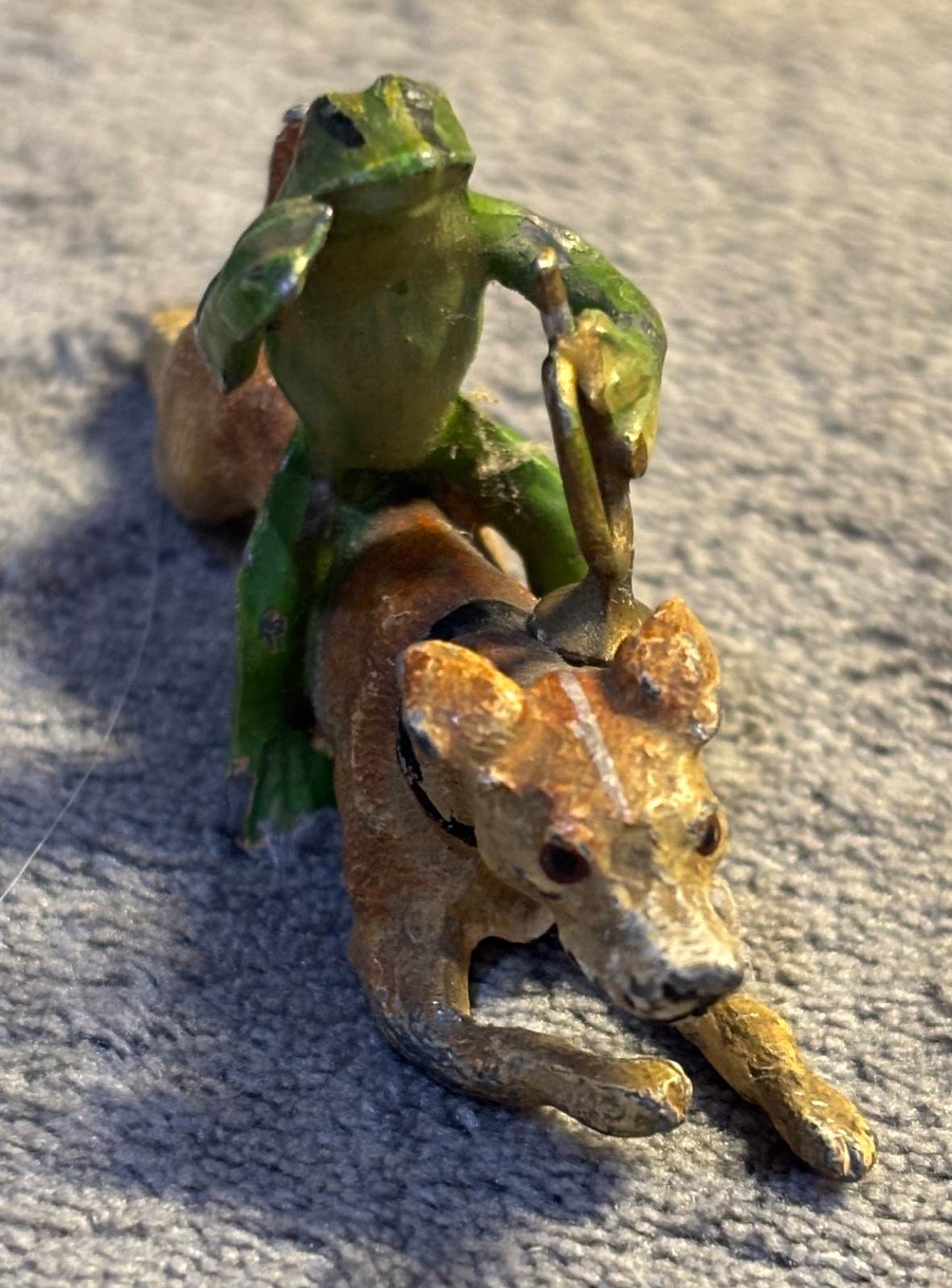 Authentic Antique Cold-Painted Metal Frog Holding a Bugle Riding a Dog