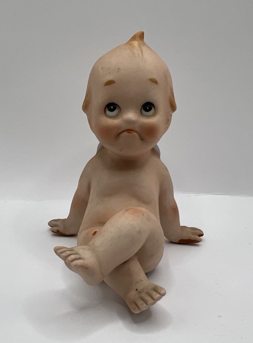 Bisque Kewpie Figurine 3” Adorable Sitting Pose with Sad Expression Vintage