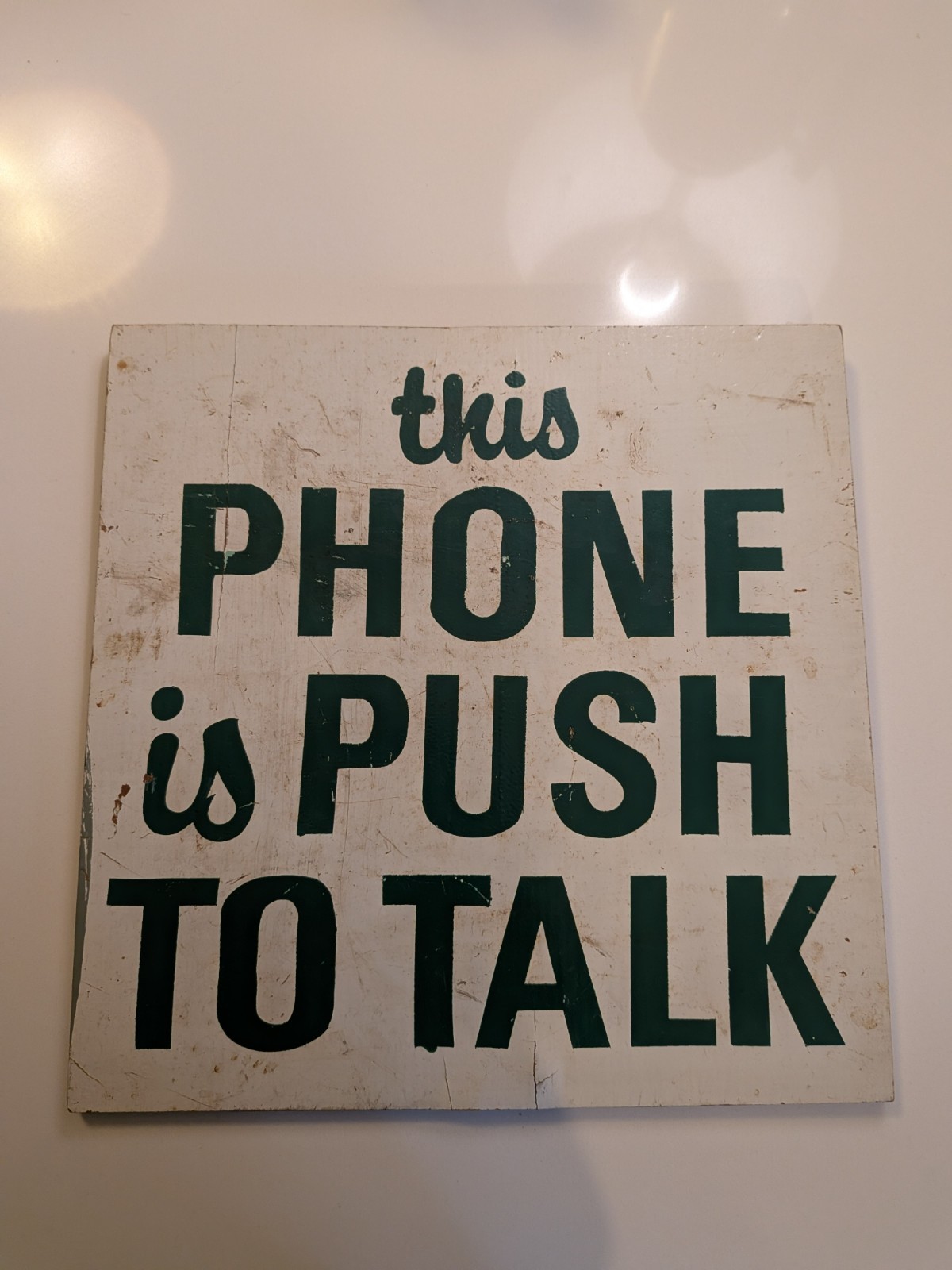 vintage wooden painted phone sign, telecommunications