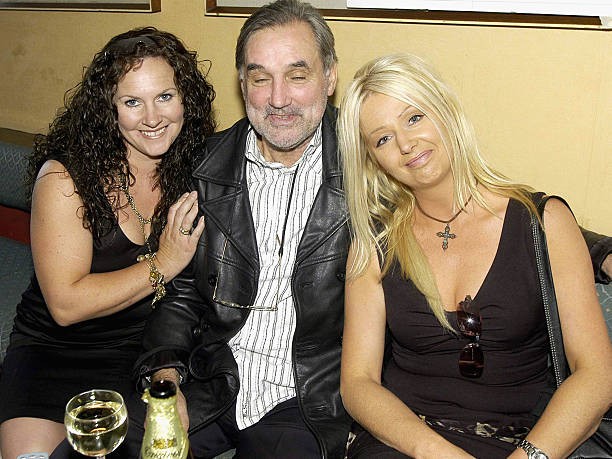 Celebrity former soccer legend George Best enjoys the company of s- Old Photo 1