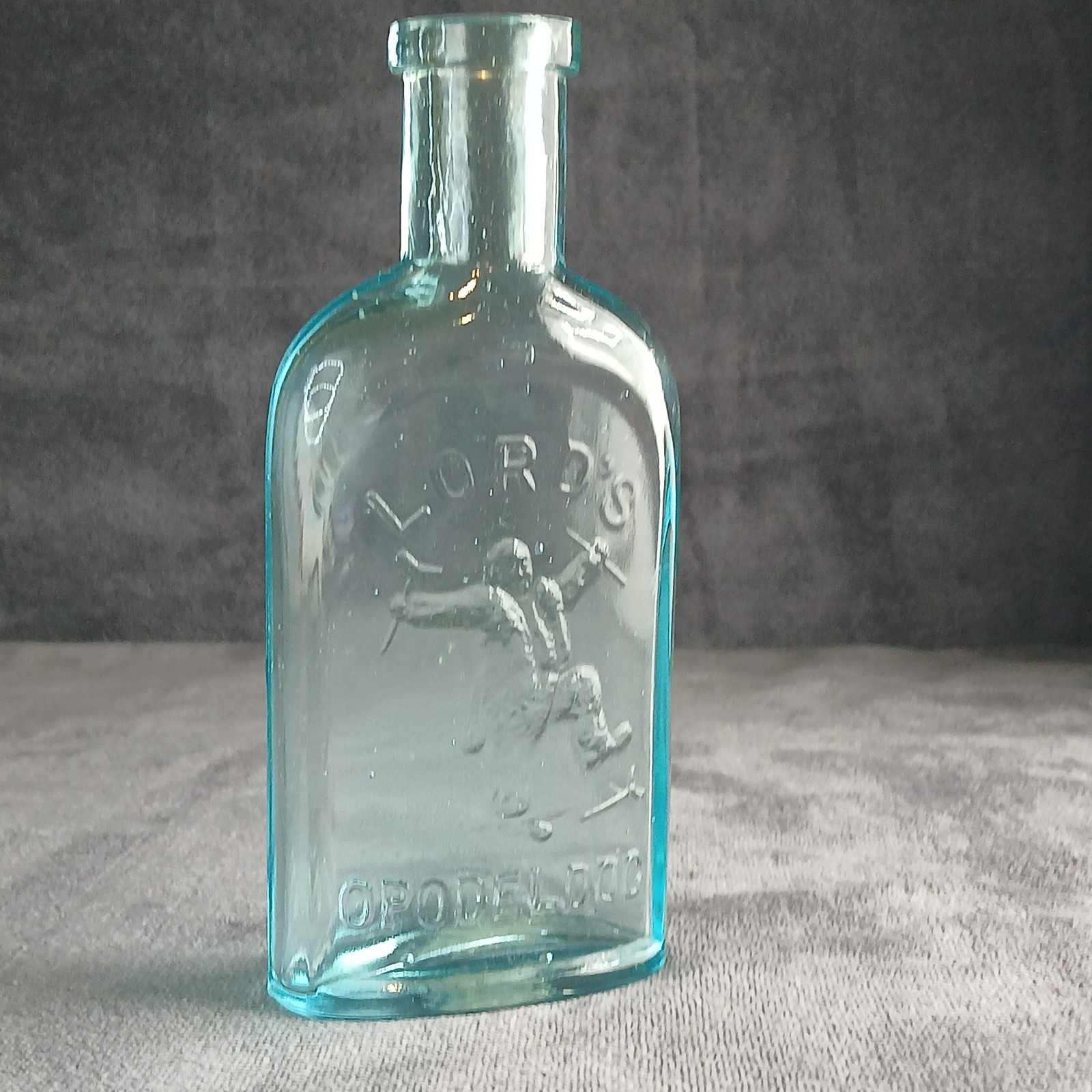 Lord’s Opodeldoc Quack Medicine Bottle ~ Man Breaking Crutches ~ Blown 1890s Era