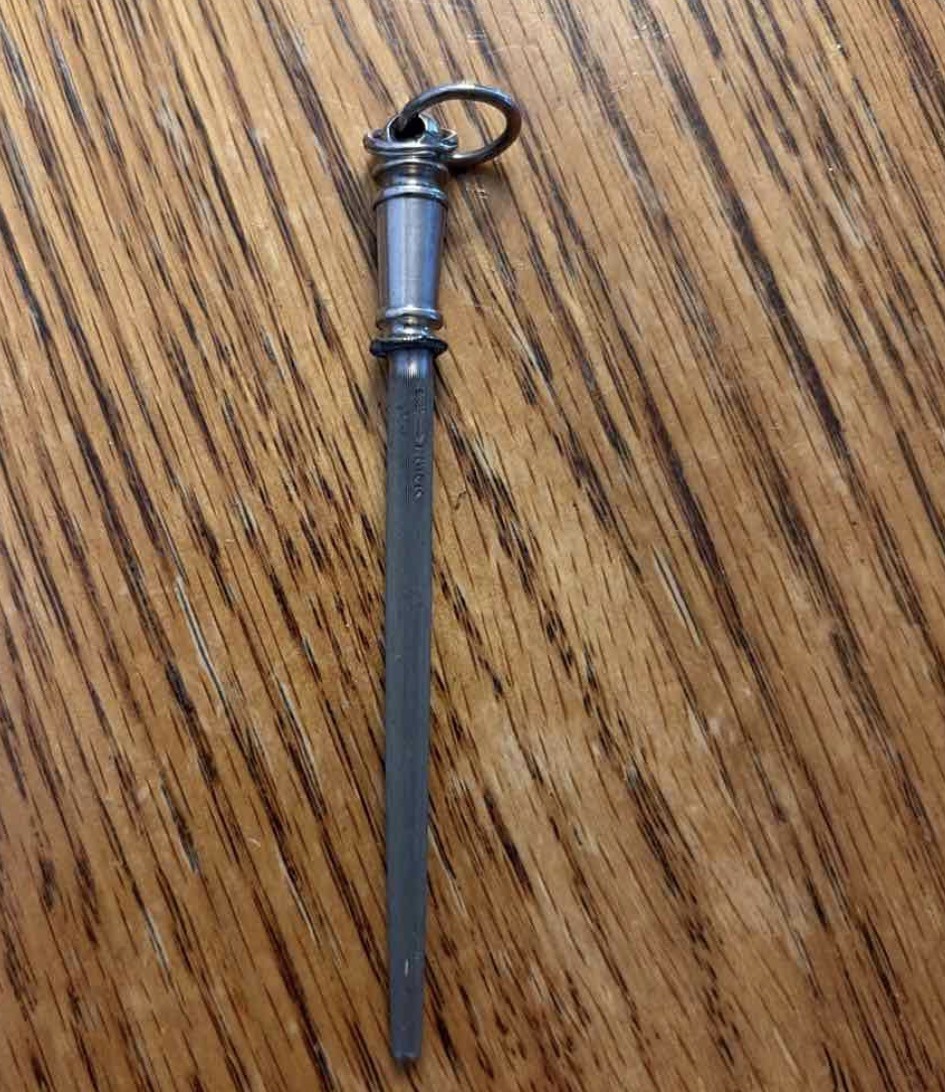 Antique miniature F. Dick steel sharpening fob.