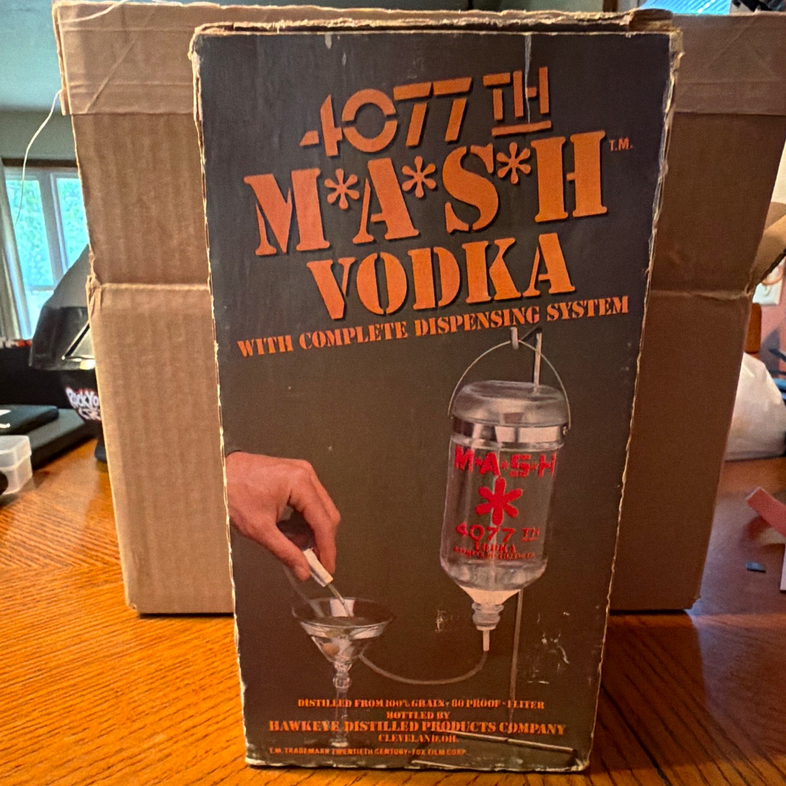 4077th Mash Vodka Advertising Bottle w/ Dispensing System in Box,please read 4077th Mash Vodka Advertising Bottle w/ Dispensing System in Box,please read
