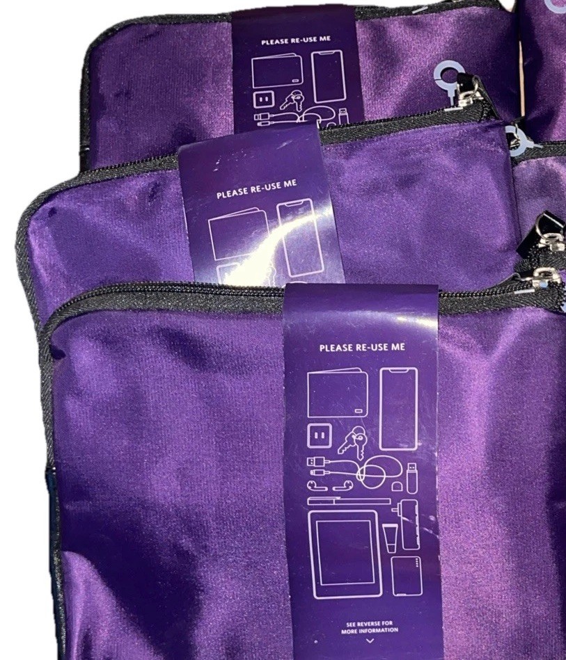 3 Delta One Premium Perfecting The Journey Amenity Kits TUMI Maroon Plum 3 Bags