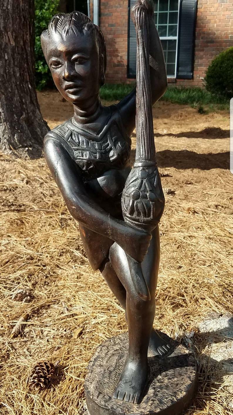 Woman Playing the Shekere Sculpture Woman Playing the Shekere Sculpture