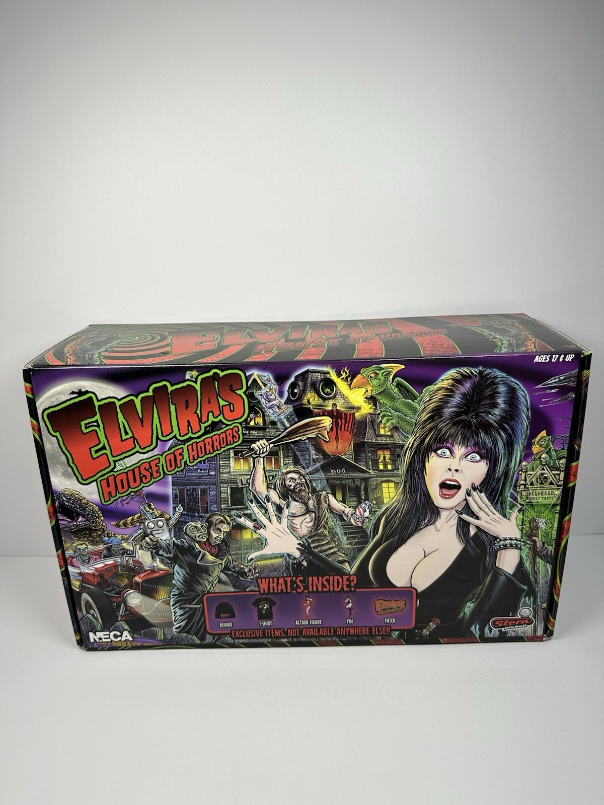 NECA Elvira's House of Horrors Box Set Beanie T-Shirt Figure Pin Patch (Size XL) NECA Elvira's House of Horrors Box Set Beanie T-Shirt Figure Pin Patch (Size XL)