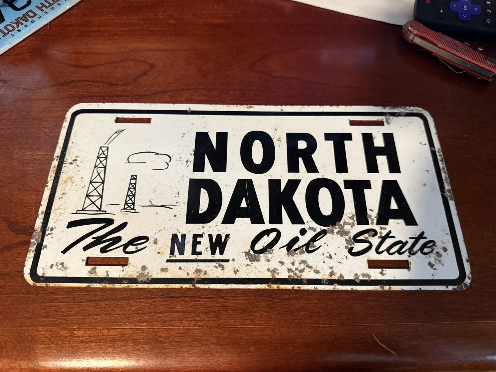 1950s North Dakota Booster License Plate Oil state