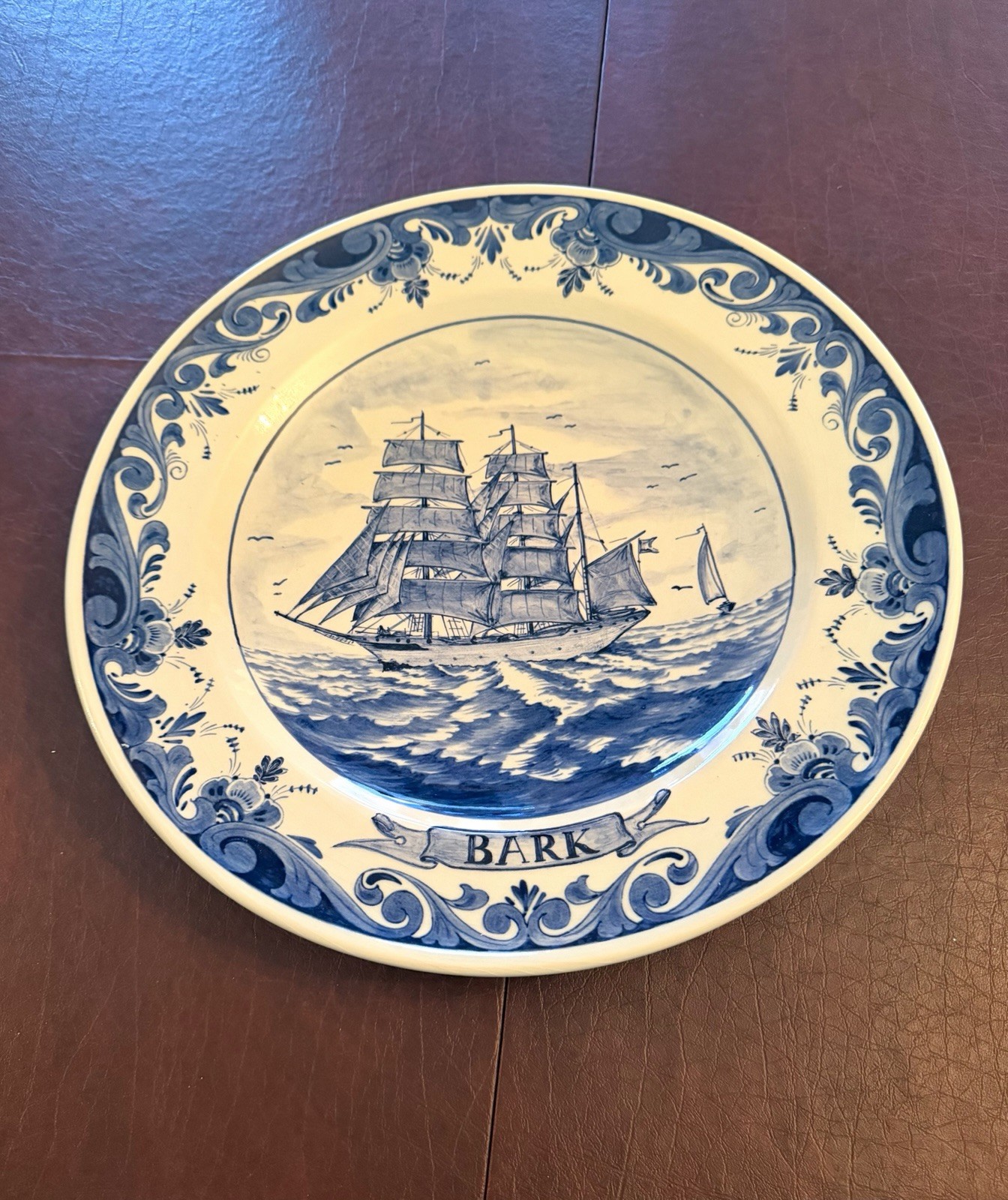 Hand-painted blue & white Dutch Delft ceramic decorative plate w/sailing ship. Hand-painted blue & white Dutch Delft ceramic decorative plate w/sailing ship.