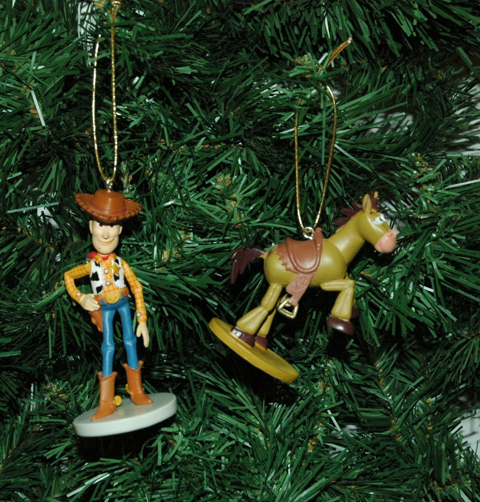 A Pair of Woody and Bullseye Toy Story Christmas Ornaments