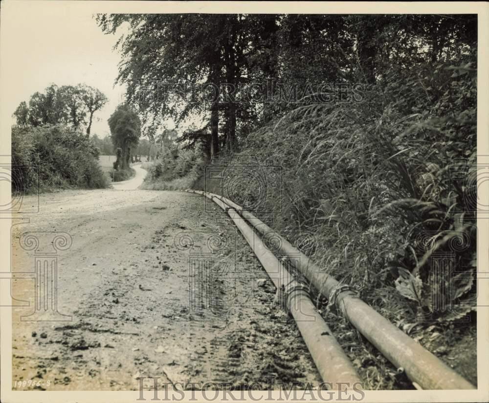 1944 Press Photo Gasoline pipeline in France laid by American engineers WWII 1944 Press Photo Gasoline pipeline in France laid by American engineers WWII