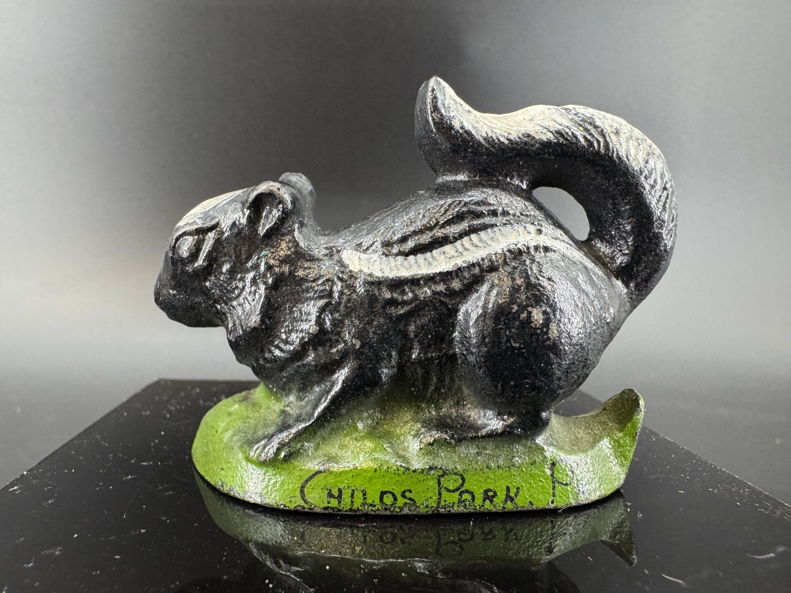 Vintage Cast Iron Painted Skunk Bottle Opener
