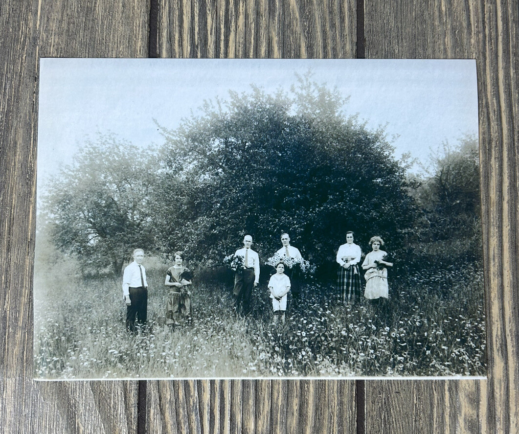 Vintage Black And White 7 People In Flower Greenery Field Photo Reprint 6 5/8” 