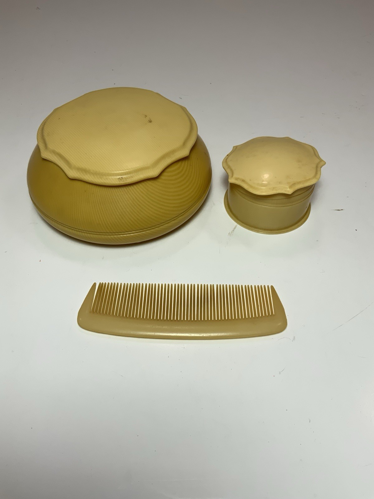 Vintage Celluloid Powder Box, Comb & Cream Jar Vintage Celluloid Powder Box, Comb & Cream Jar