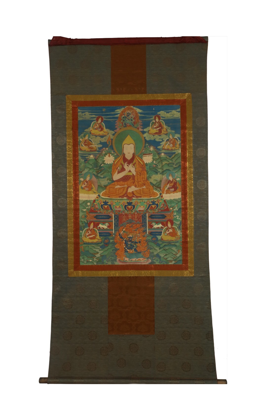 A Tibetan Thangka on Silk Frame A Tibetan Thangka on Silk Frame