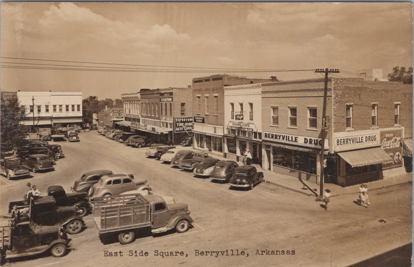 East Side Square Berryville Arkansas AR Coca Cola Cafe Firestone RPPC Postcard